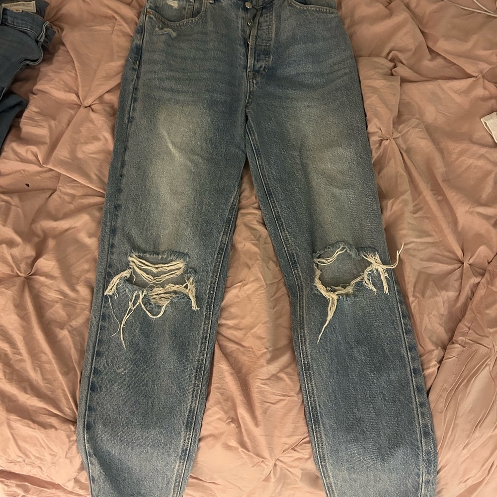 Distressed Blue Jeans